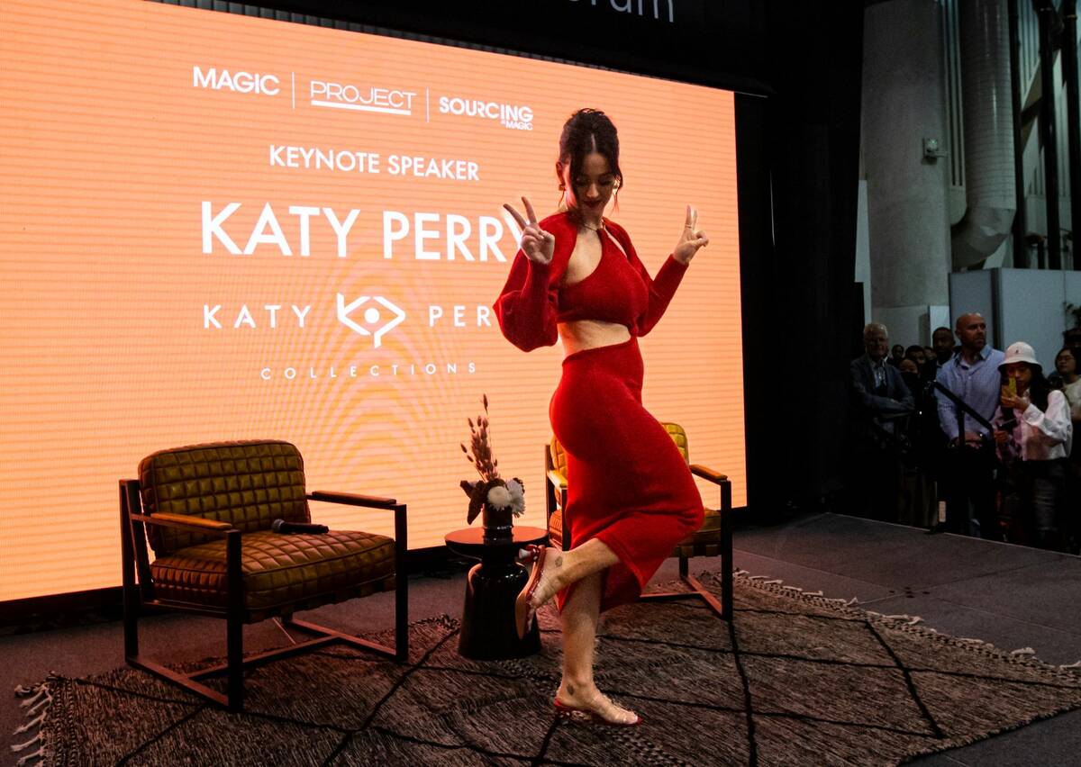 Katy Perry poses after speaking during the MAGIC Las Vegas fashion trade show on on Tuesday, Au ...