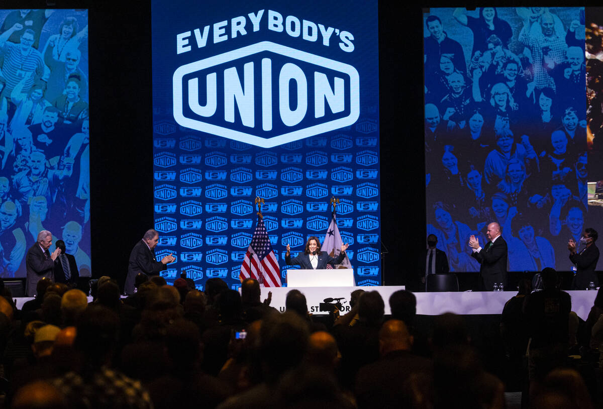 Attendees give a standing ovation as Vice President Kamala Harris speaks at a United Steelworke ...