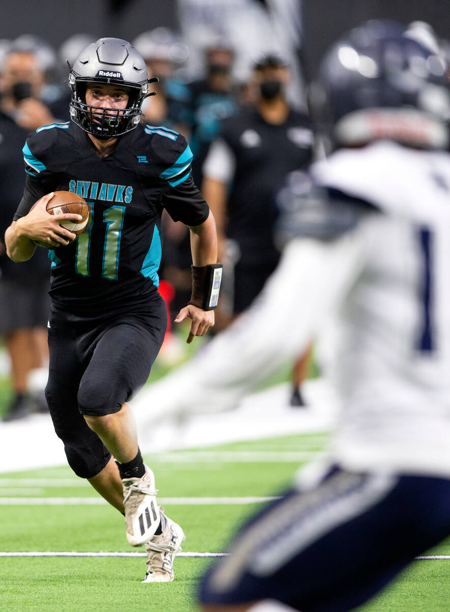 Silverado quarterback Brandon Tunnell (11) runs with the ball during the first half of the Clas ...