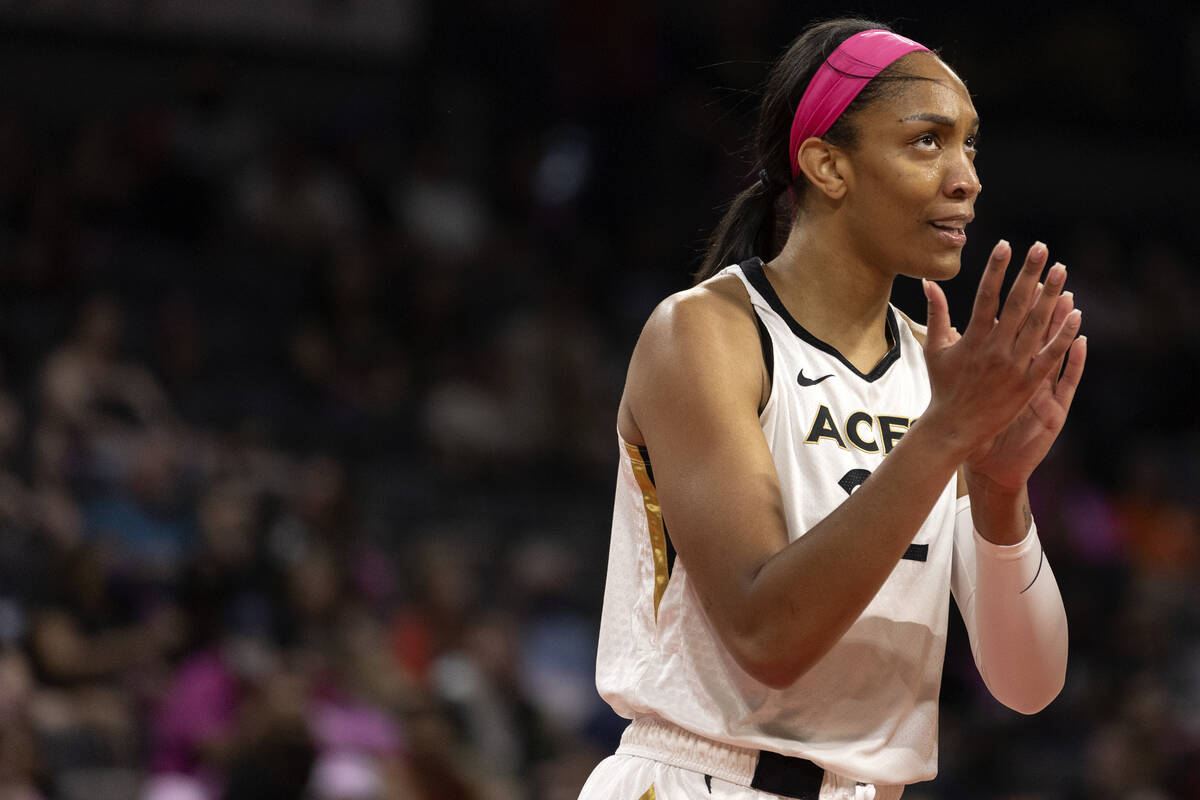 Las Vegas Aces forward A'ja Wilson (22) claps after a foul is called on the Chicago Sky during ...