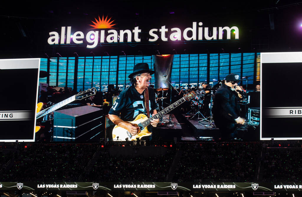 Musician and Las Vegas resident Carlos Santana performs at halftime during an NFL preseason foo ...