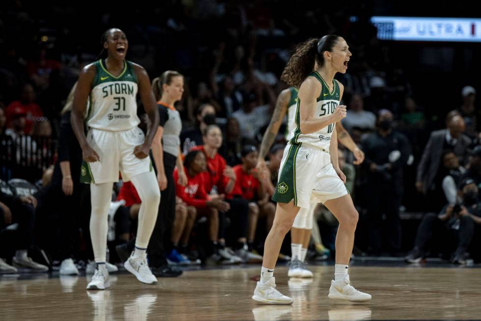 Seattle Storm's Sue Bird (10) celebrates in the first half of the Storm's game against the Aces ...
