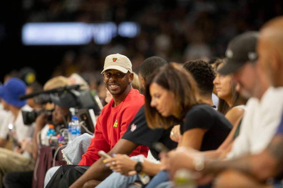 NBA star Chris Paul watches the Aces take on the Seattle Storm at Michelob Ultra Arena on Sunda ...