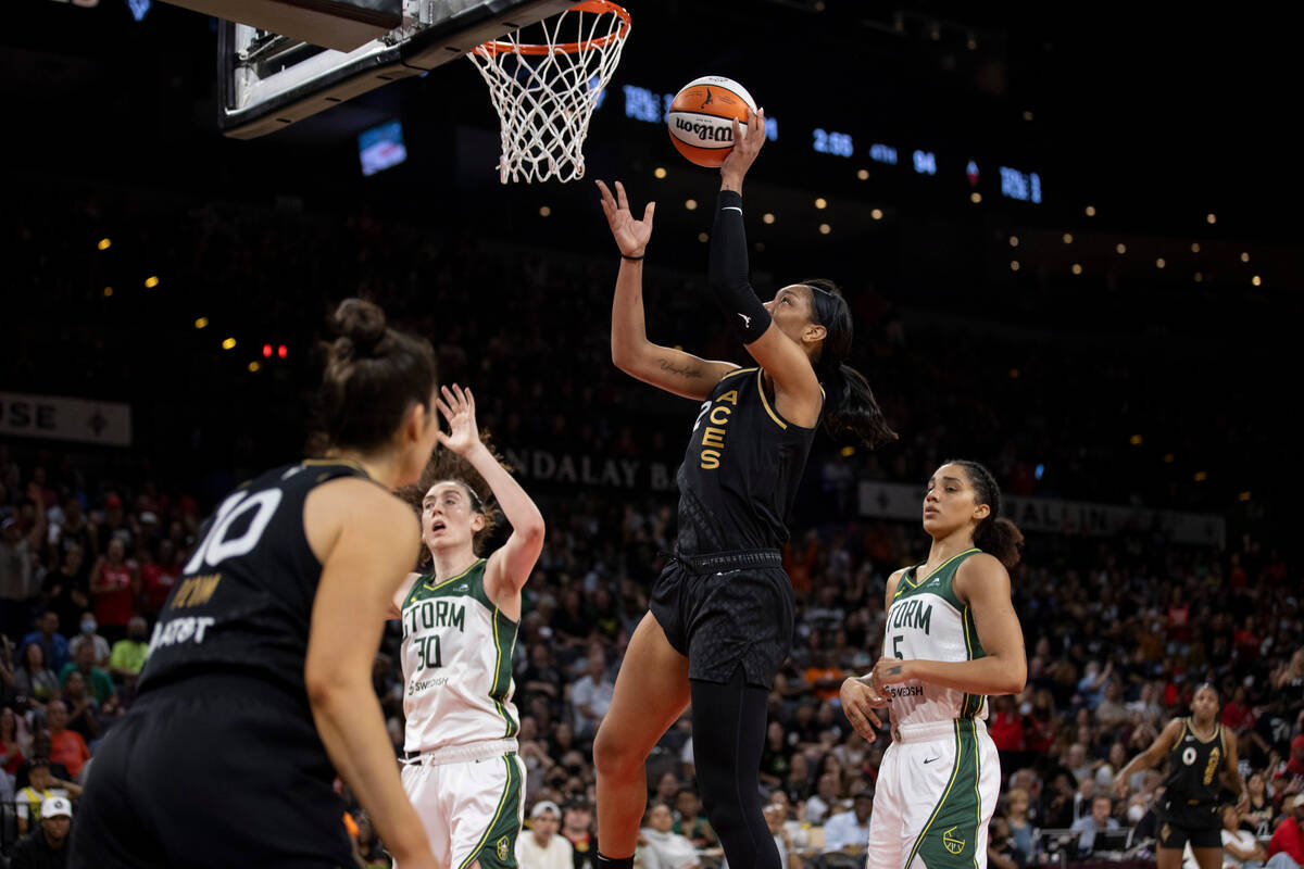 A'ja Wilson (22) goes up for a shot as the Las Vegas Aces face the Seattle Storm in the last re ...