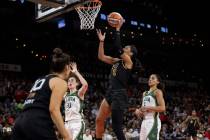 A'ja Wilson (22) goes up for a shot as the Las Vegas Aces face the Seattle Storm in the last re ...