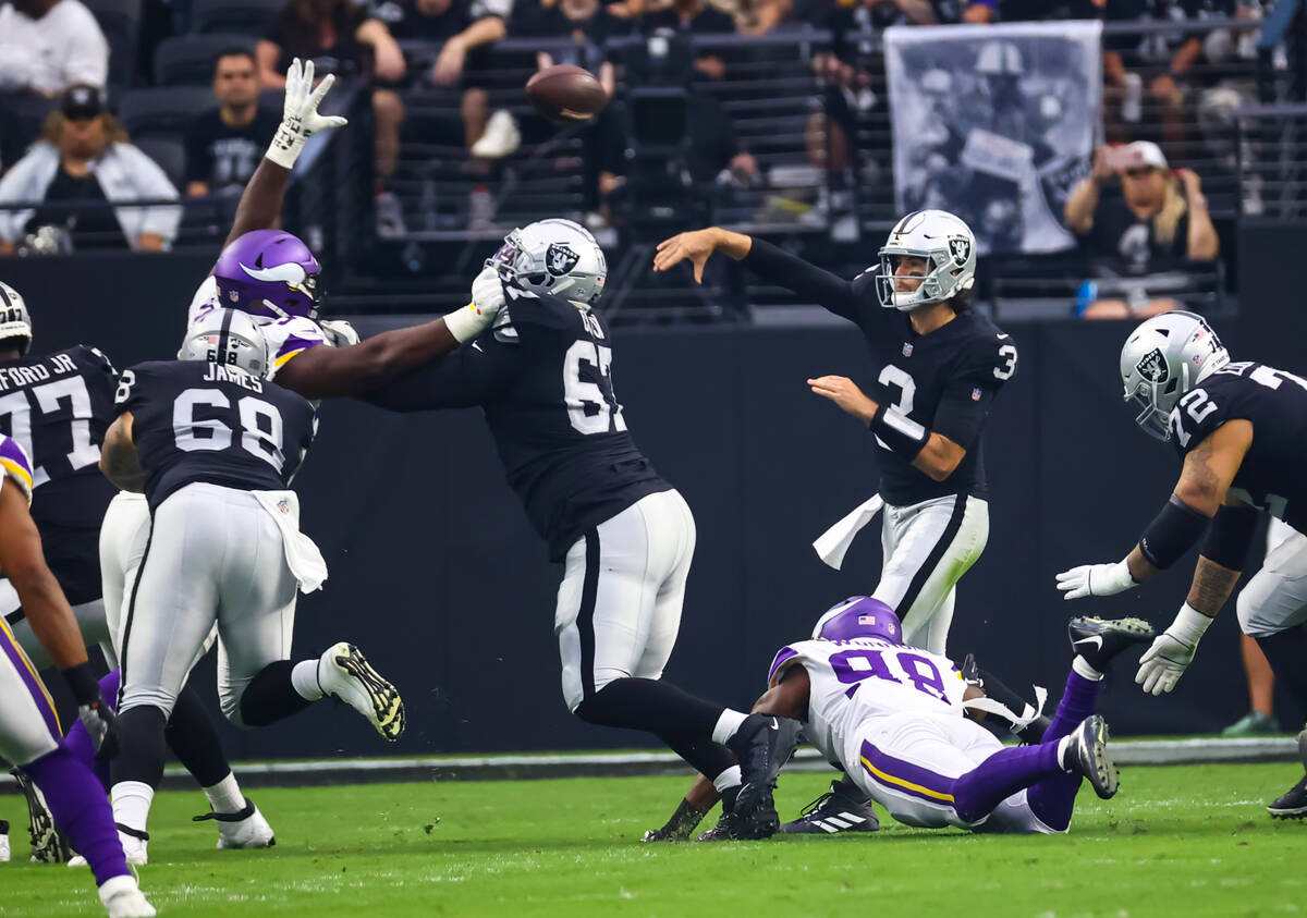 Raiders quarterback Jarrett Stidham (3) throws a pass during the first half of an NFL preseason ...