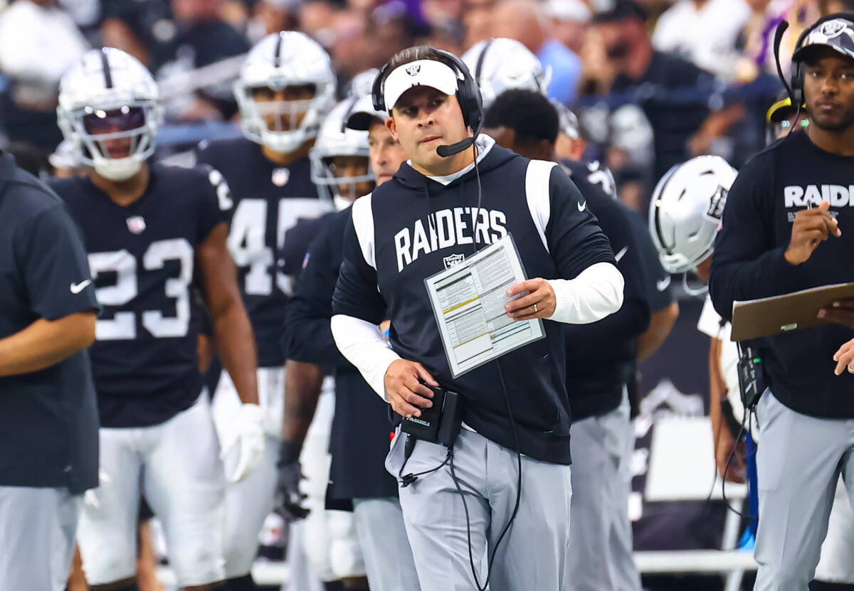 Raiders head coach Josh McDaniels looks on from the sideline while playing the Minnesota Viking ...
