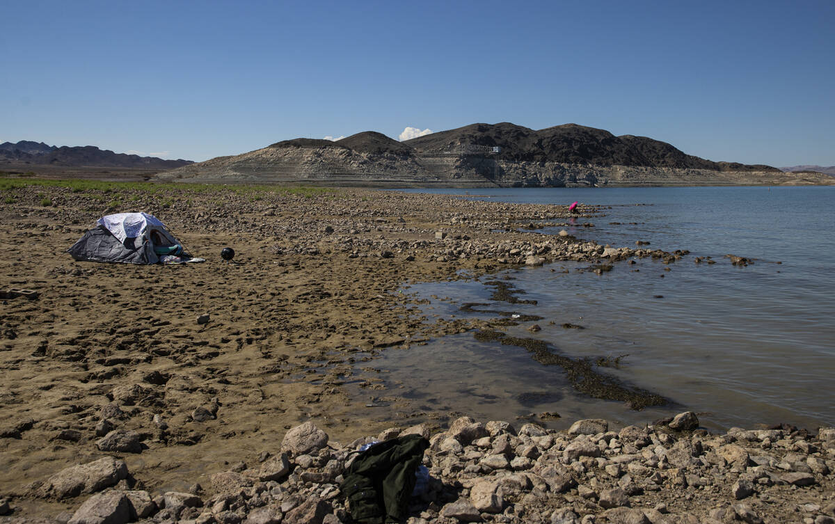 People relax by Swim Beach at Lake Mead National Recreation Area, the day after human remains w ...