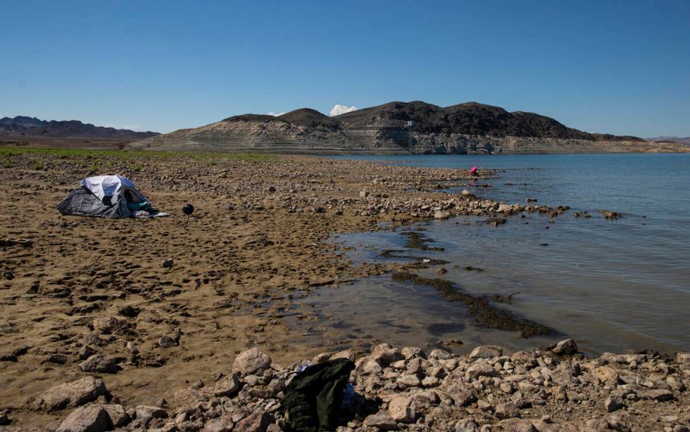 People relax by Swim Beach at Lake Mead National Recreation Area, the day after human remains w ...