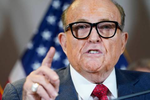 Former New York Mayor Rudy Giuliani, a lawyer for President Donald Trump, speaks during a news ...