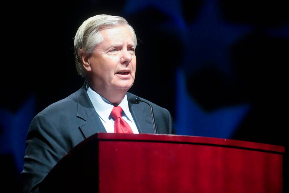 Sen. Lindsey Graham, R-S.C., addresses a South Carolina GOP dinner July 29, 2022, in Columbia, ...