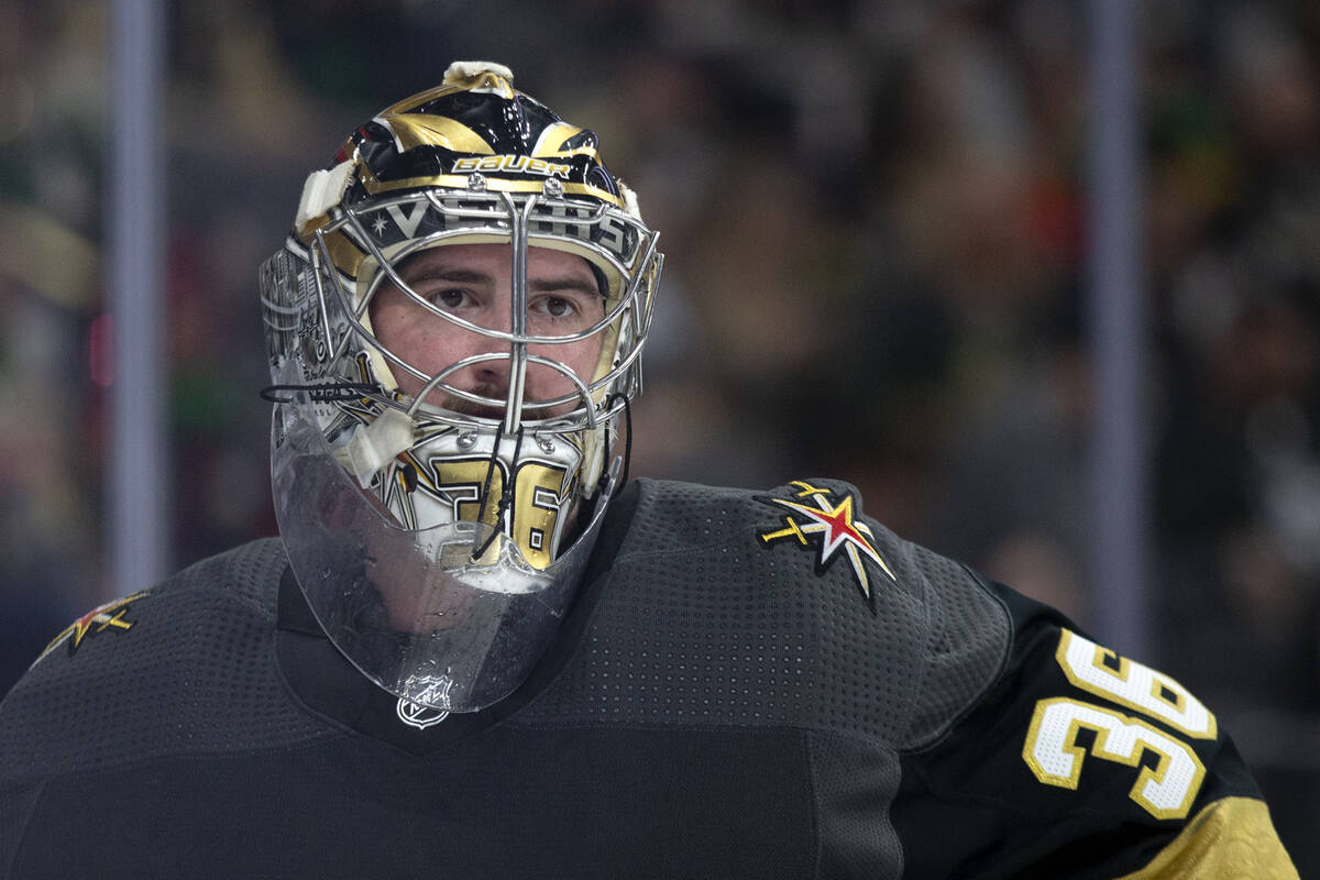 Golden Knights goaltender Logan Thompson (36) skates around the net during the second period of ...