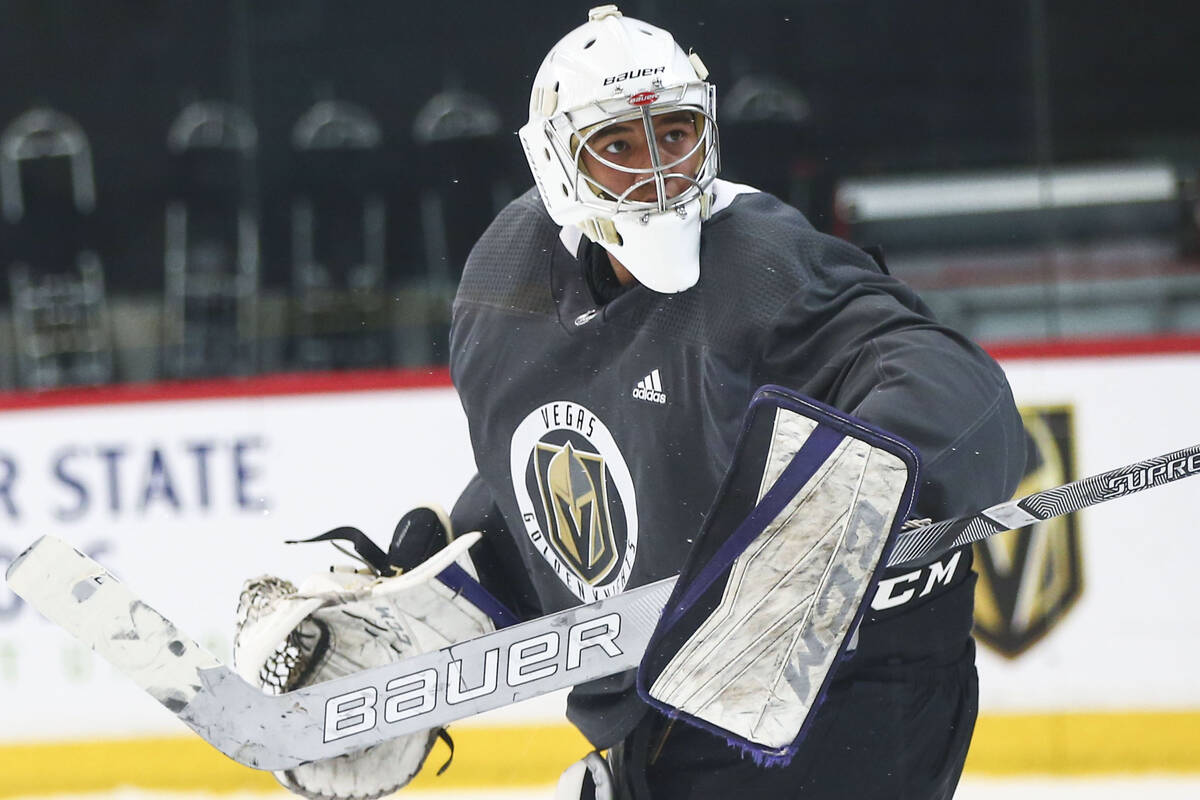 Golden Knights prospect Isaiah Saville defends the net during the first day of development camp ...