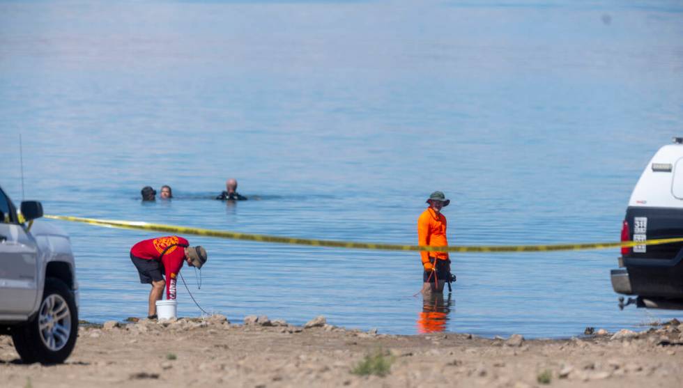 Divers are in the water as authorities are assessing what were described as skeletal remains fo ...