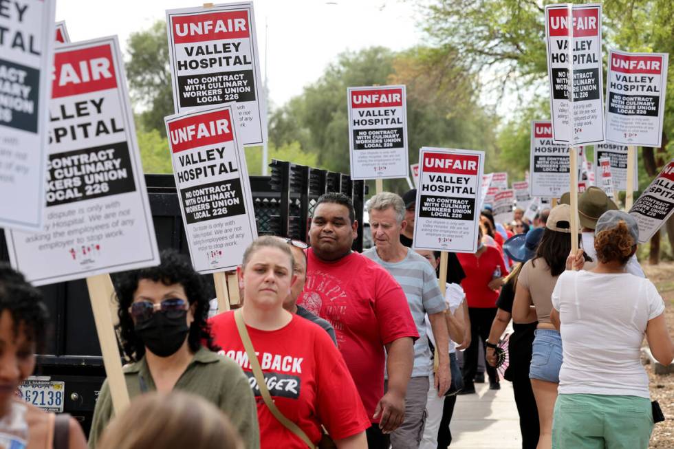 Members of the Culinary Union and supporters picket Valley Hospital Medical Center in Las Vegas ...