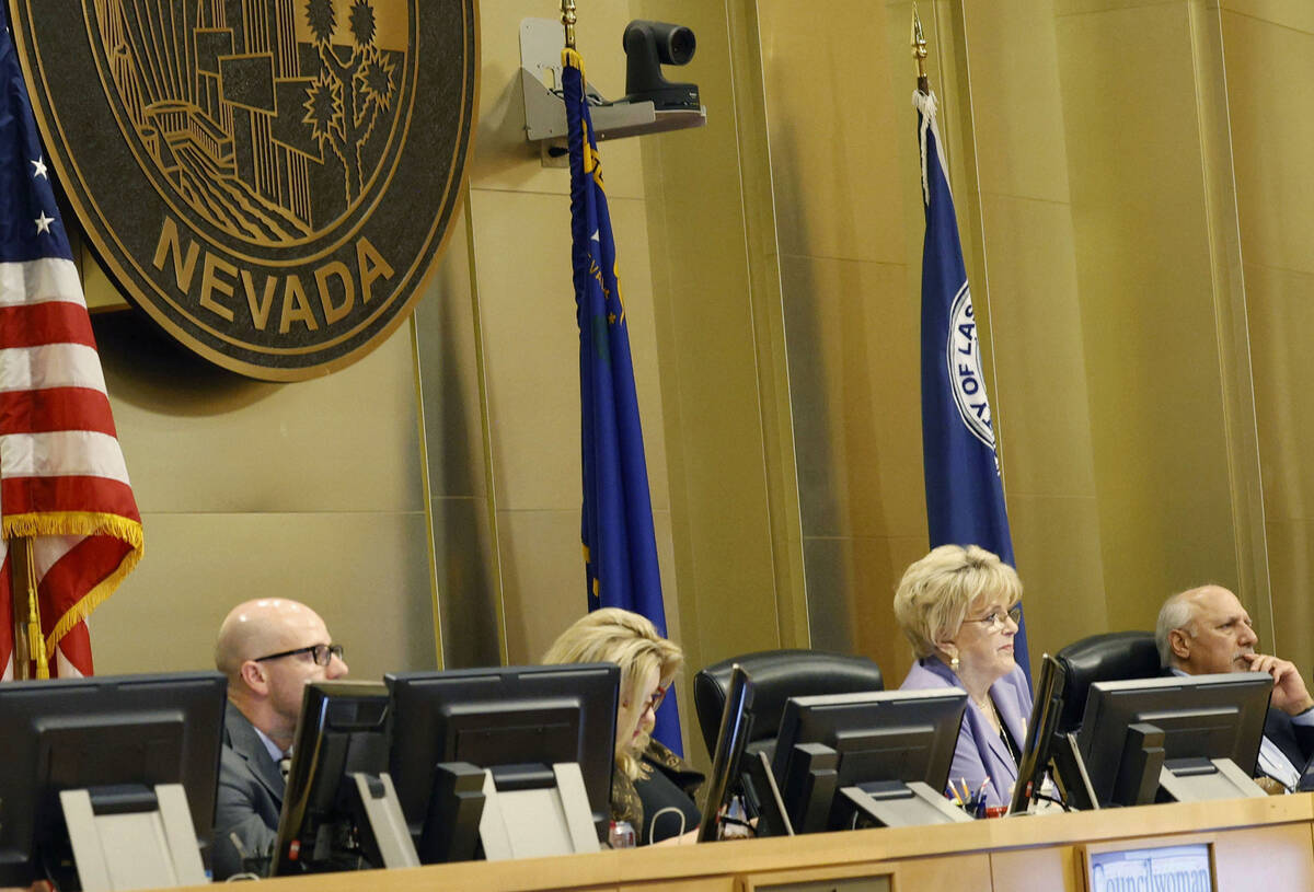 Las Vegas Mayor Carolyn Goodman, forth from left, and City Council members listen to speakers, ...