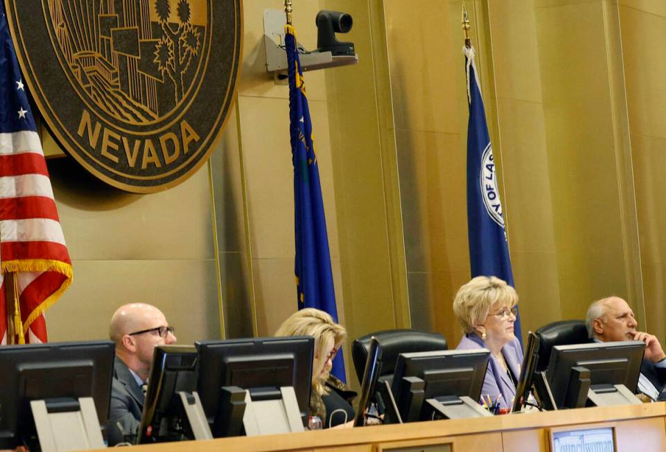 Las Vegas Mayor Carolyn Goodman, forth from left, and City Council members listen to speakers, ...