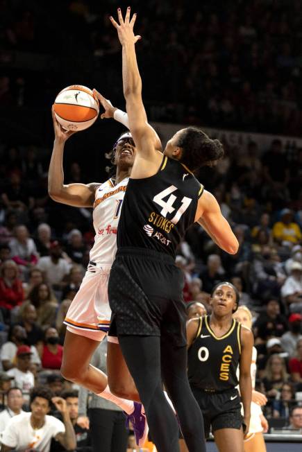 Phoenix Mercury guard Diamond DeShields (1) shoots against Las Vegas Aces center Kiah Stokes (4 ...