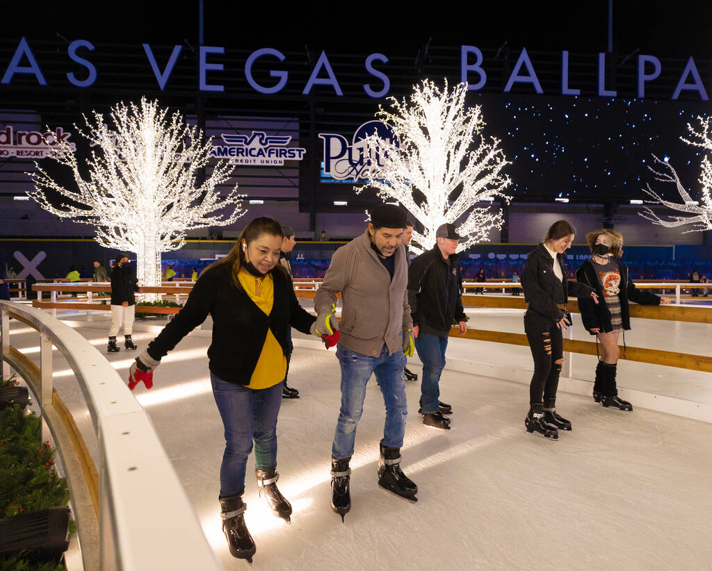 Ice skaters enjoy Enchant Christmas at Las Vegas Ballpark on Tuesday, Nov. 30, 2021, in Las Veg ...