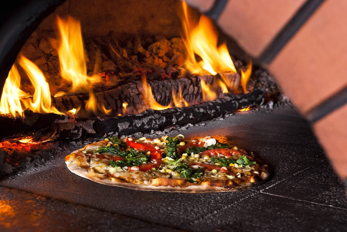 Getty Images For pizza enthusiasts, wood-fired brick ovens will give you the most authentic woo ...