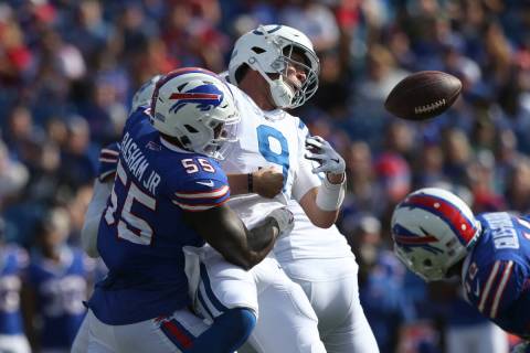 Buffalo Bills defensive end Boogie Basham (55) forces a fumble by Indianapolis Colts quarterbac ...