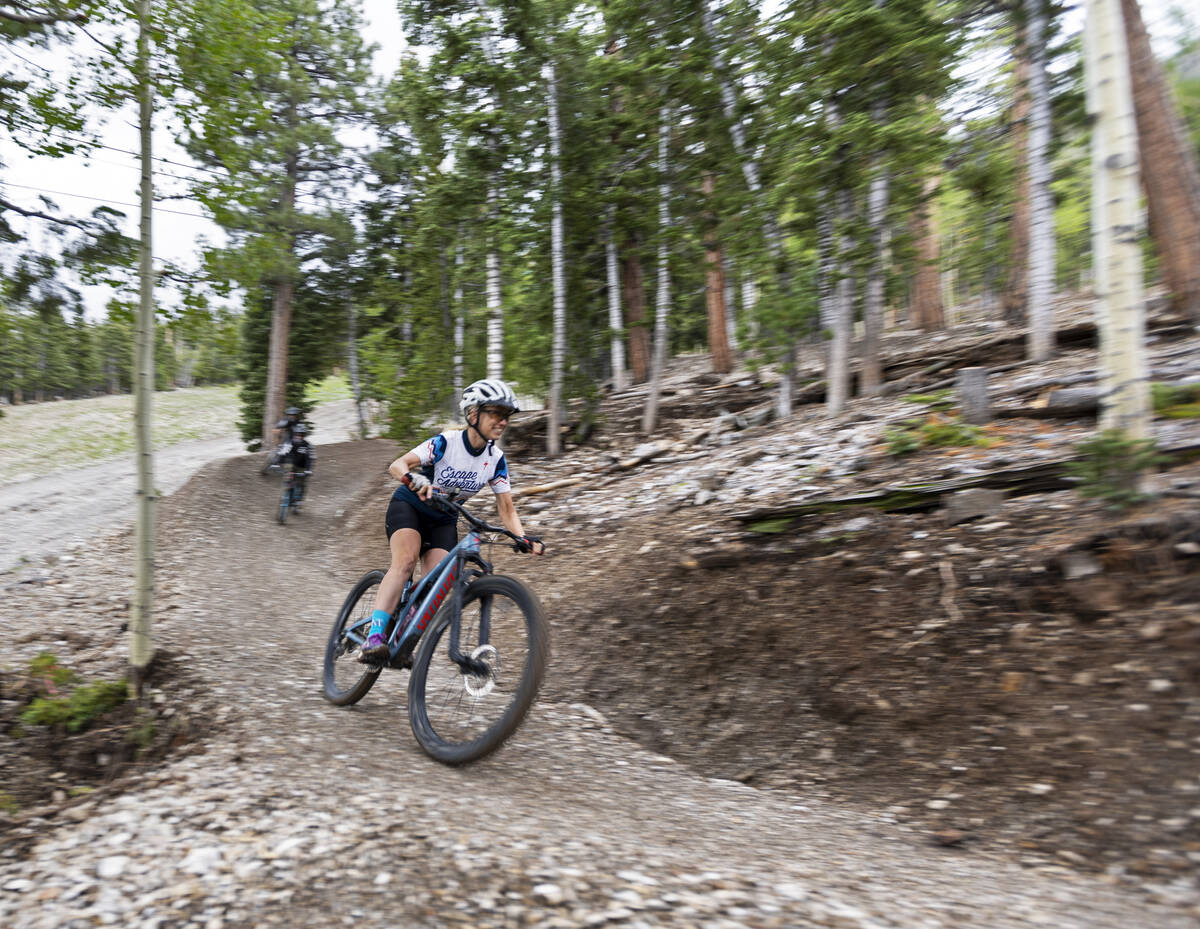 Heather Fisher, president for Save Red Rock and Las Vegas Cyclery, rides down a new downhill mo ...