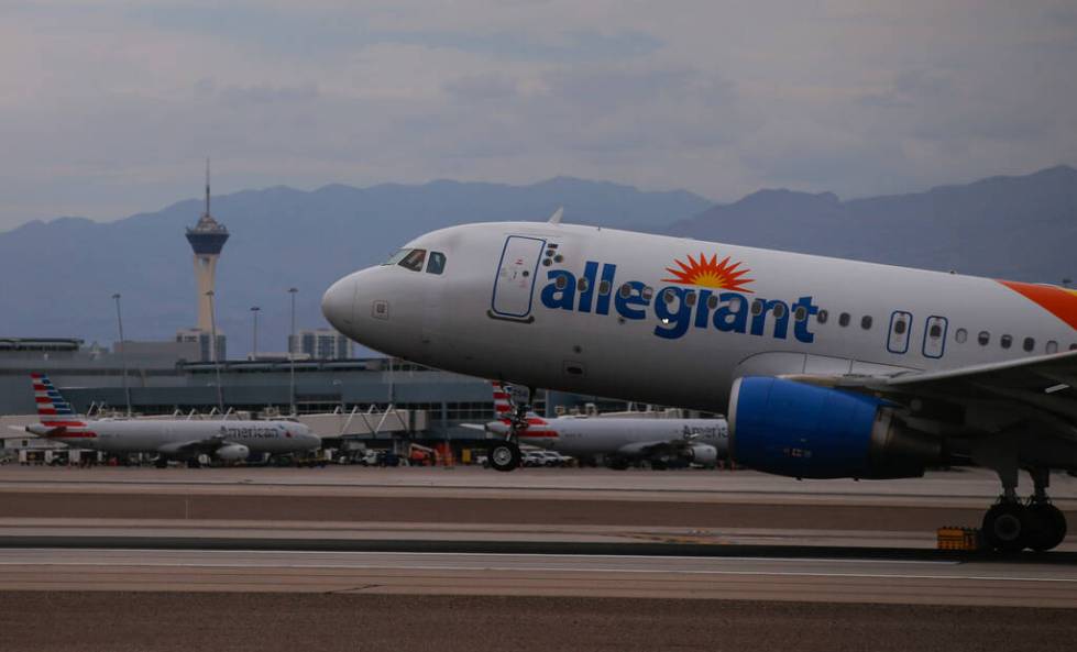 An Allegiant Air plane lands at Harry Reid International Airport on Tuesday, July 26, 2022, in ...