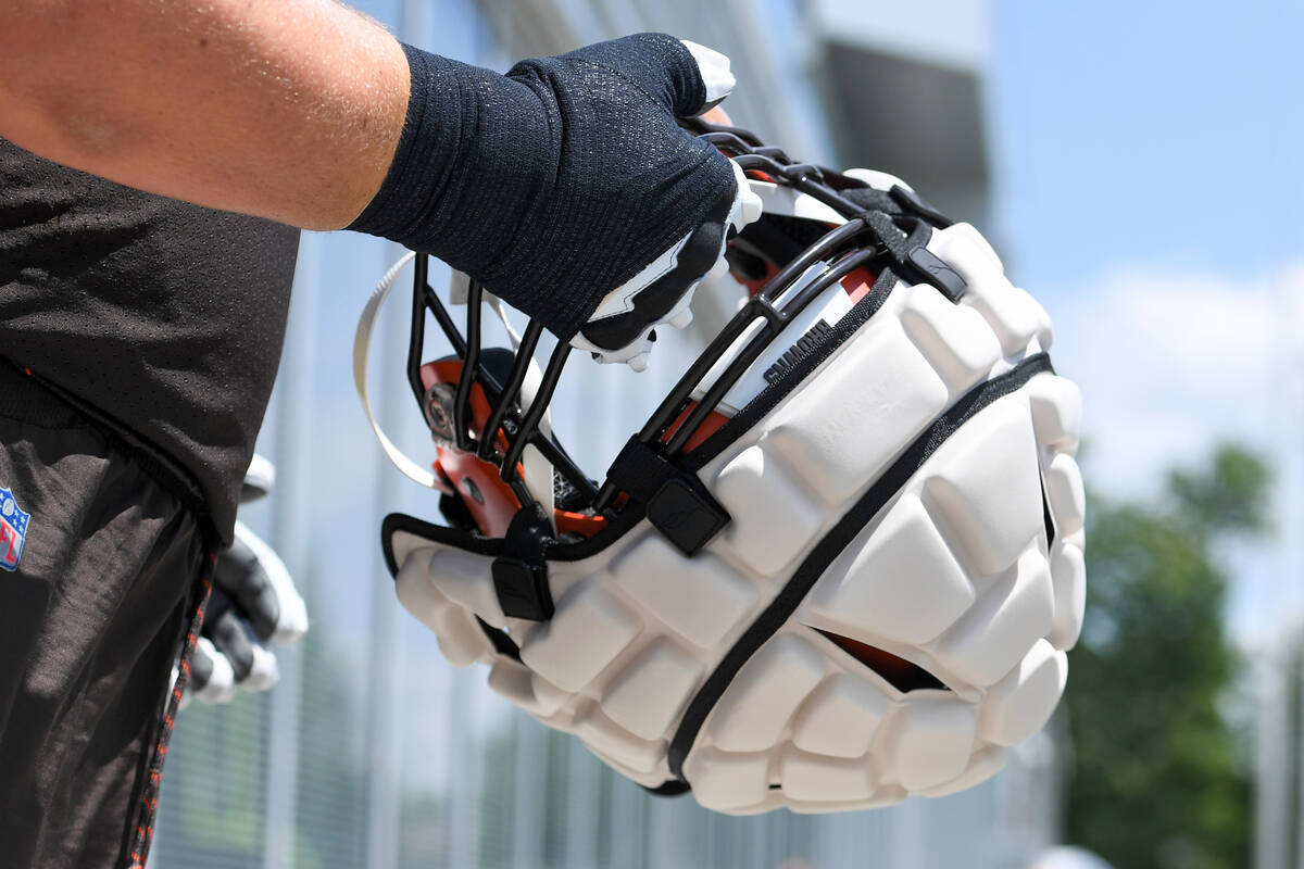 A closeup view of a Guardian Cap on a Cleveland Browns helmet during the NFL football team's tr ...