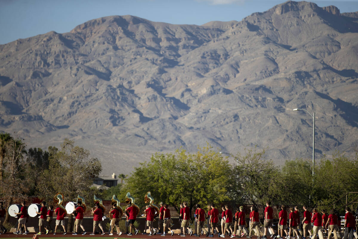 Arbor View High School marching band enters the field as Arbor View hosts Snow Canyon for the f ...