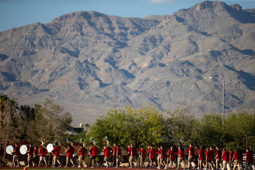 Arbor View High School marching band enters the field as Arbor View hosts Snow Canyon for the f ...