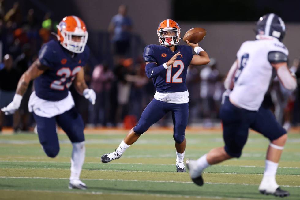 Bishop Gorman's quarterback Micah Alejado (12) throws a pass against Corner Canyon during the f ...