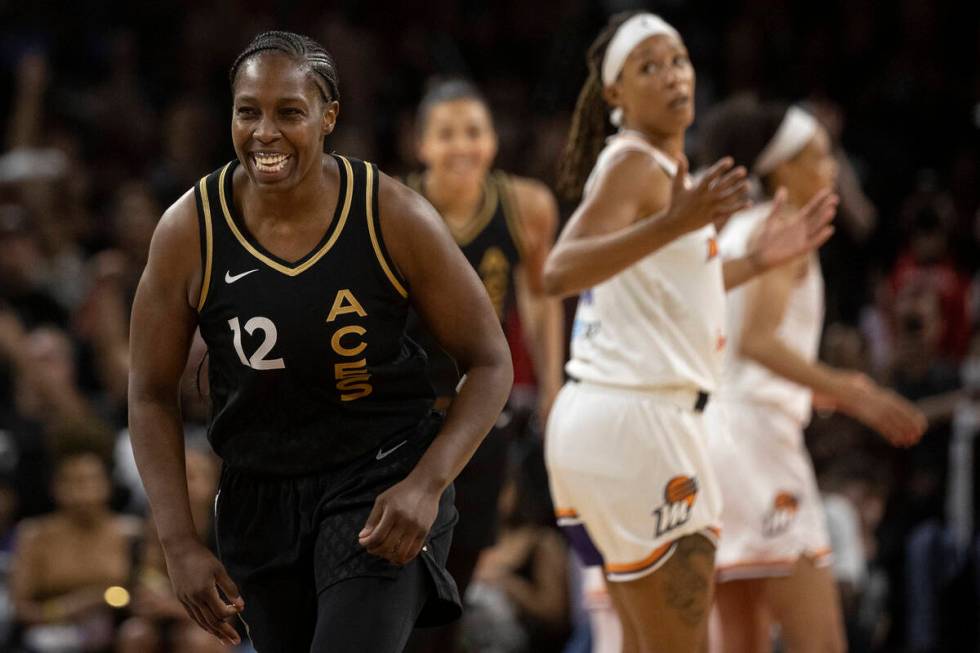 Las Vegas Aces guard Chelsea Gray (12) celebrates after scoring a 3-point shot against the Phoe ...