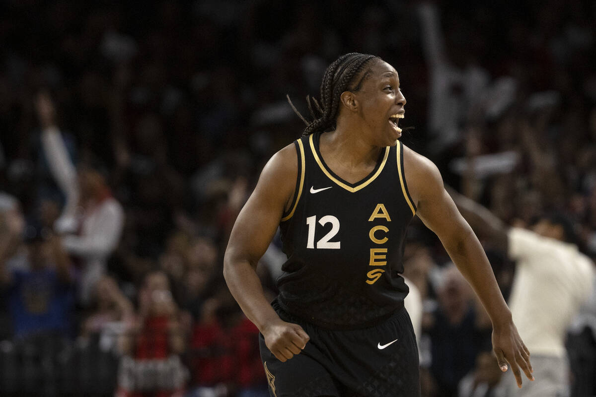 Las Vegas Aces guard Chelsea Gray (12) celebrates after scoring a 3-point shot against the Phoe ...