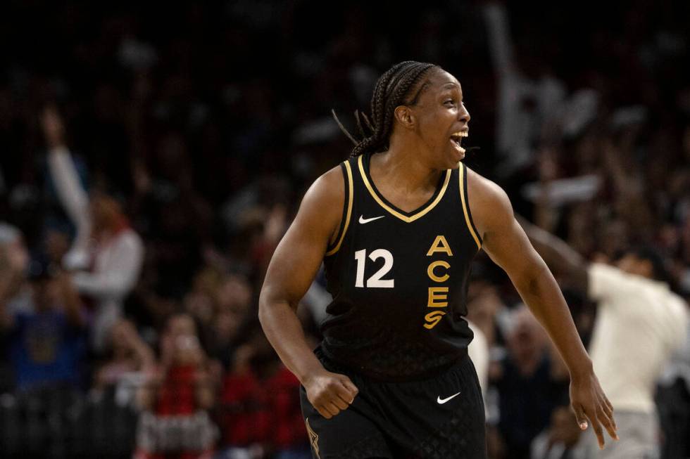 Las Vegas Aces guard Chelsea Gray (12) celebrates after scoring a 3-point shot against the Phoe ...