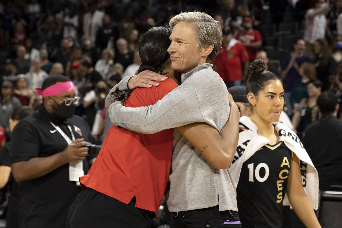 Phoenix Mercury head coach Vanessa Nygaard hugs Las Vegas Aces forward A'ja Wilson after the Ac ...