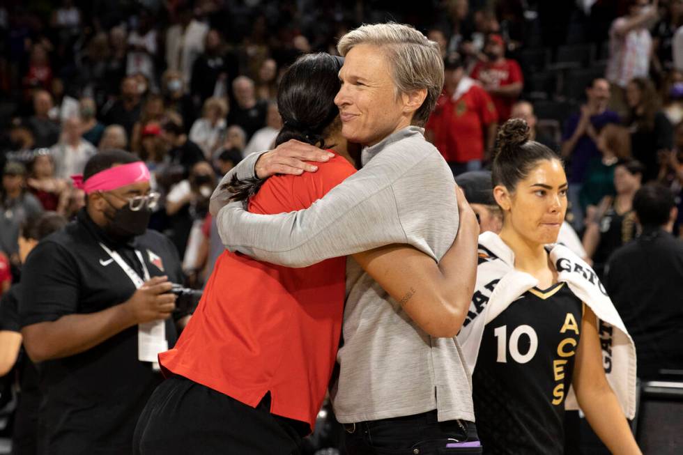 Phoenix Mercury head coach Vanessa Nygaard hugs Las Vegas Aces forward A'ja Wilson after the Ac ...