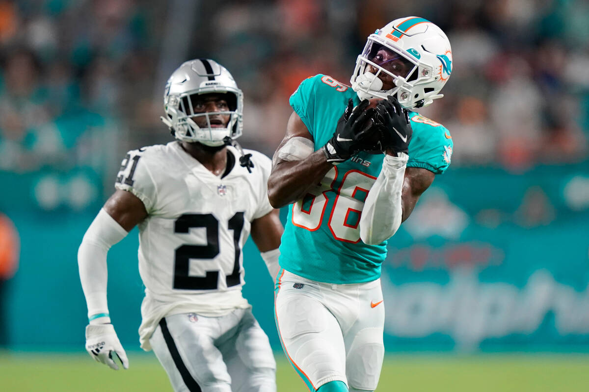 Miami Dolphins wide receiver Braylon Sanders (86) catches a pass ahead of Las Vegas Raiders cor ...