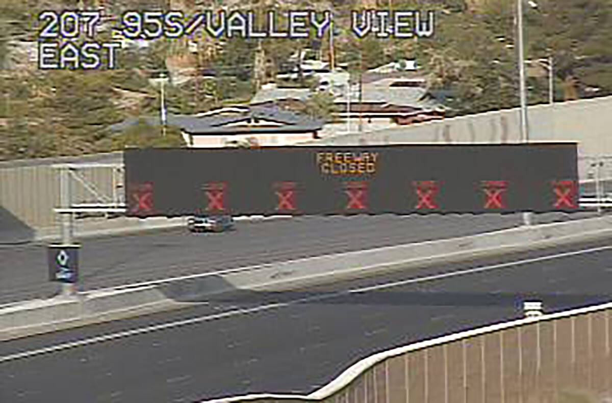 The overhead board shows all lanes closed on southbound US 95 near Valley View about 5:45 p.m. ...