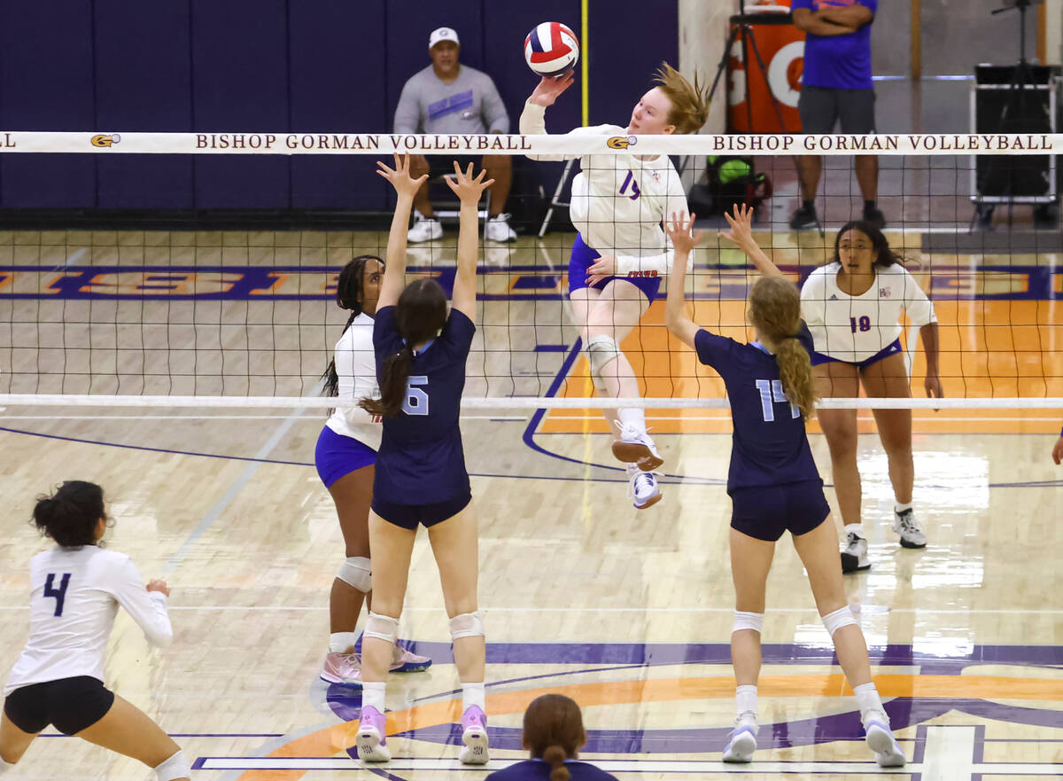 Bishop Gorman's Ashley Duckworth (19) sends the ball over the net against Centennial during a v ...