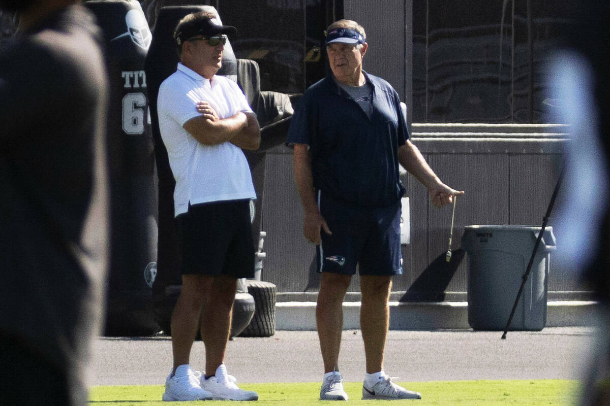 New England Patriots head coach Bill Belichick, right, during a joint NFL training camp practic ...