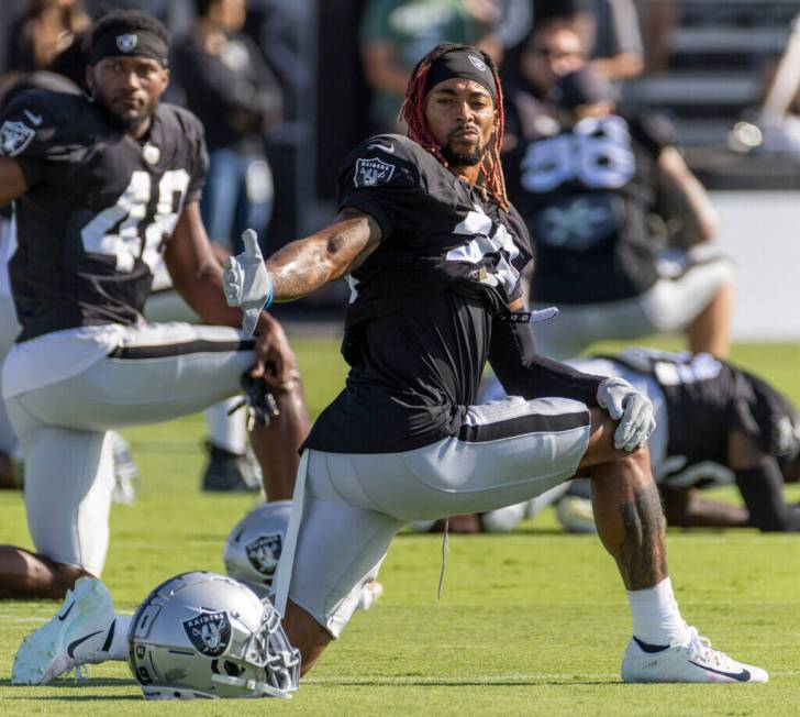 Raiders cornerback Anthony Averett (29) stretches during the team’s training camp practi ...