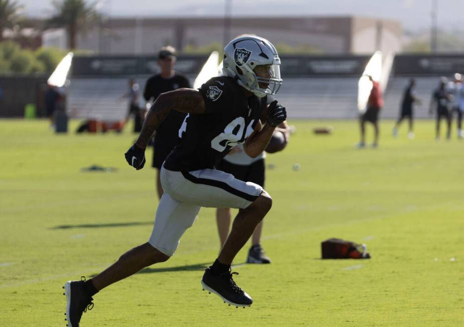 Raiders wide receiver Keelan Cole (84) runs a route during the team’s training camp prac ...