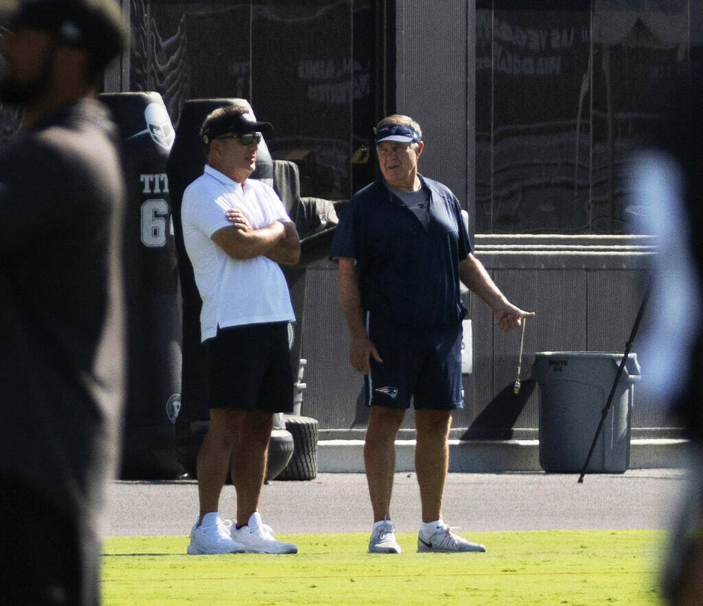 New England Patriots head coach Bill Belichick, right, during a joint NFL training camp practic ...
