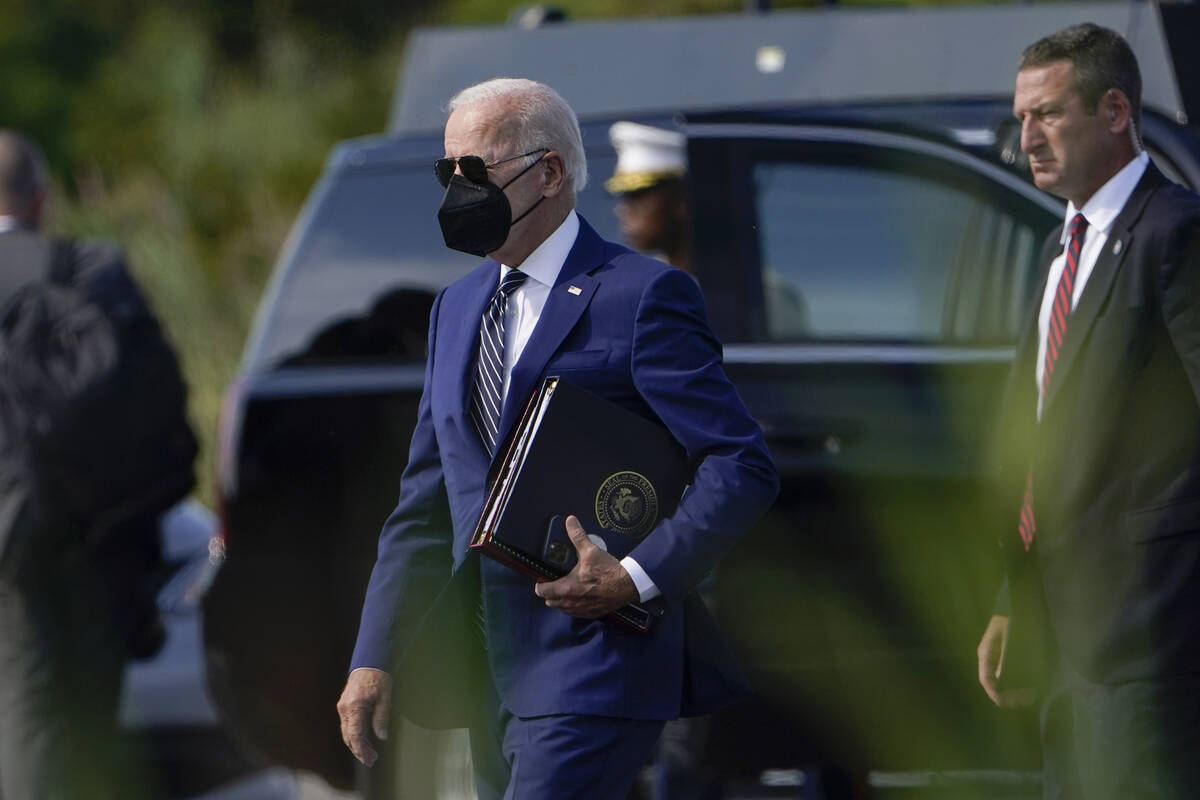 President Joe Biden arrives to board Marine One at Gordons Pond State Park in Rehoboth Beach, D ...