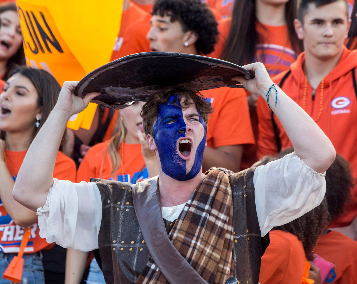 Bishop Gorman fan Anchor Brant reacts to an early score by visiting team Mater Dei on Friday, A ...