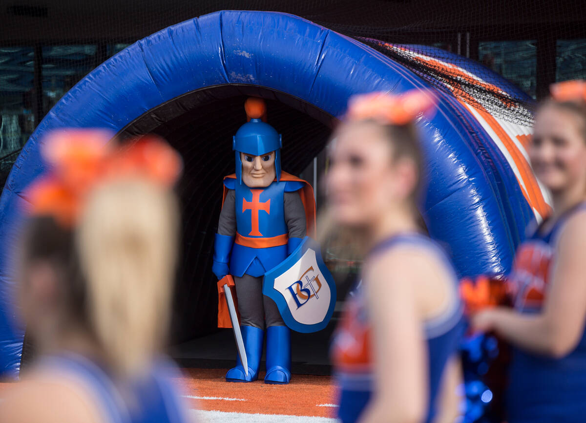 The Bishop Gorman mascot waits to take the field before the start of the Gaels home matchup wit ...