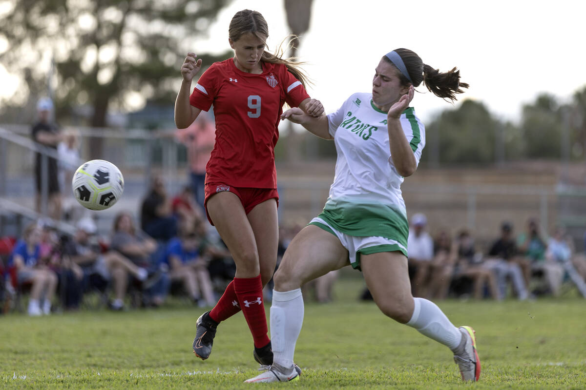 Arbor View’s Taylor Chowaniec (9) collides with Green Valley’s Sofia Grant (20) d ...
