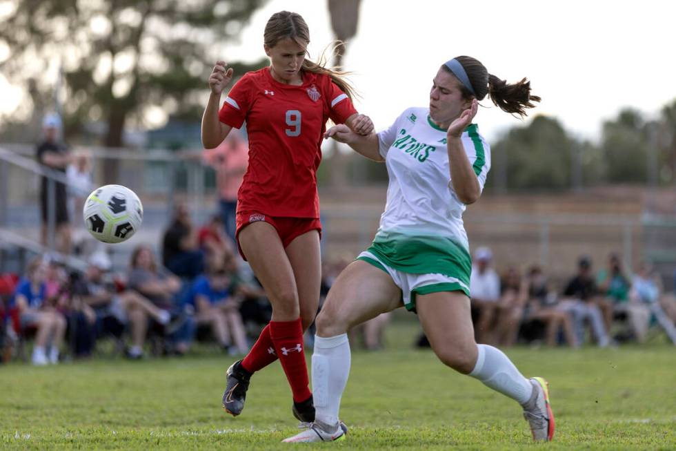 Arbor View’s Taylor Chowaniec (9) collides with Green Valley’s Sofia Grant (20) d ...
