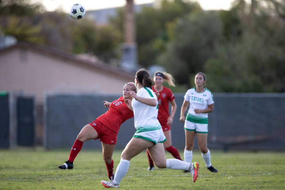 Arbor View’s Isabella Srodes (16) passes to a teammate while Green Valley’s Sofia ...