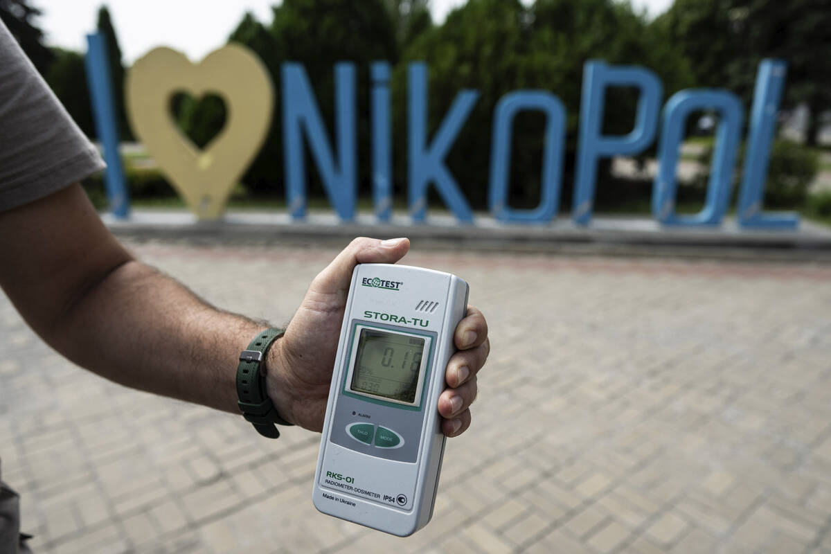 FILE - A Geiger counter shows increased radiation level in Nikopol, Ukraine, Aug, 22, 2022. Ukr ...